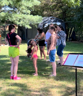 Group in motion during a Laughing Llama laughter yoga session in Kenosha, Wisconsin.