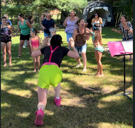Outdoor laughter yoga group participating together in Kenosha, Wisconsin.