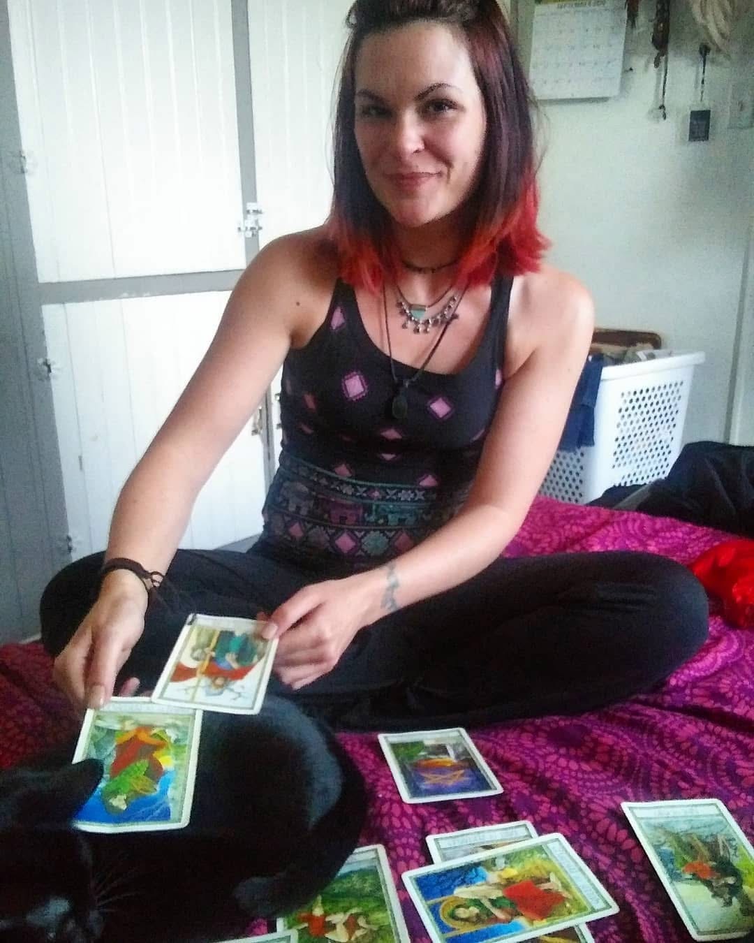 Mel at a cozy tarot reading setup in Kenosha, Wisconsin.