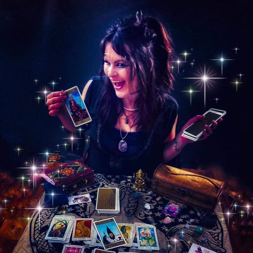Mel providing a tarot reading for Laughing Llama in Southeastern Wisconsin.